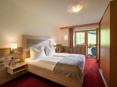 Ein Bett oder Betten in einem Zimmer der Unterkunft Apart Magdalena