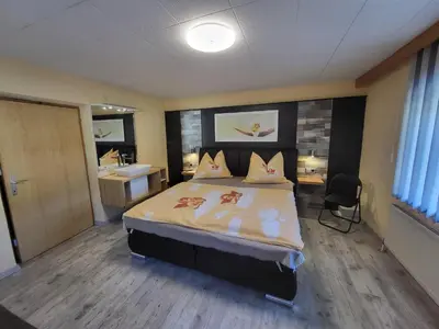 Ein Bett oder Betten in einem Zimmer der Unterkunft Ferienwohnung Gerti