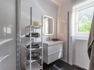 Ein Badezimmer in der Unterkunft Chalet Achenberg