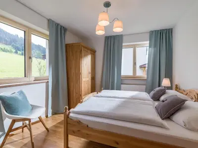 Ein Bett oder Betten in einem Zimmer der Unterkunft Chalet Achenberg