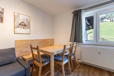 Ein Sitzbereich in der Unterkunft Appartement Ski & Bike