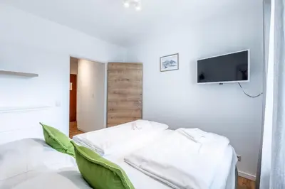 Ein Bett oder Betten in einem Zimmer der Unterkunft Appartement Ski & Bike