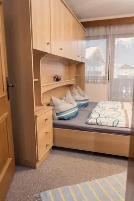 Ein Bett oder Betten in einem Zimmer der Unterkunft Ferienwohnung Aschenwald