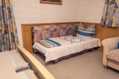 Ein Bett oder Betten in einem Zimmer der Unterkunft Ferienwohnung Aschenwald