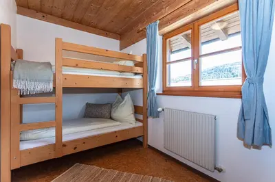 Ein Bett oder Betten in einem Zimmer der Unterkunft Bio-Bauernhof Niederlehen