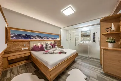 Ein Bett oder Betten in einem Zimmer der Unterkunft Apartment-Schöser