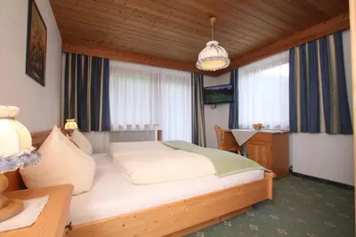 Ein Bett oder Betten in einem Zimmer der Unterkunft Gmünderklause