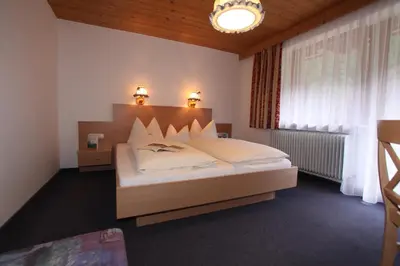 Ein Bett oder Betten in einem Zimmer der Unterkunft Gmünderklause