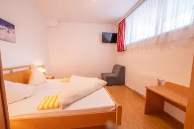 Ein Bett oder Betten in einem Zimmer der Unterkunft Sonnseitn Appartements