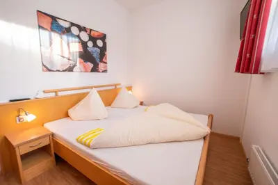 Ein Bett oder Betten in einem Zimmer der Unterkunft Sonnseitn Appartements