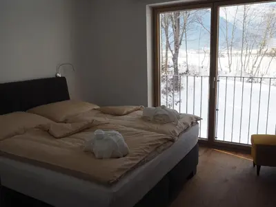 Ein Bett oder Betten in einem Zimmer der Unterkunft Apartment Smaragdblick Wildkogel