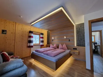 Ein Bett oder Betten in einem Zimmer der Unterkunft Chalet Strobl