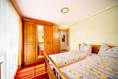Ein Bett oder Betten in einem Zimmer der Unterkunft Biohotel Castello Königsleiten