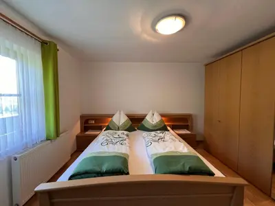 Ein Bett oder Betten in einem Zimmer der Unterkunft Apartment Bauernhof Gasteg - S by Interhome