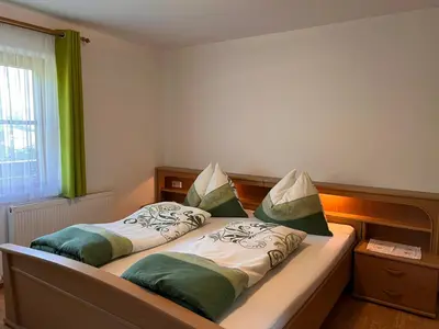Ein Bett oder Betten in einem Zimmer der Unterkunft Apartment Bauernhof Gasteg - S by Interhome