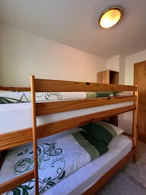 Ein Bett oder Betten in einem Zimmer der Unterkunft Apartment Bauernhof Gasteg - S by Interhome