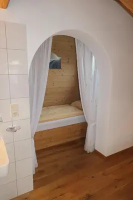 Ein Bett oder Betten in einem Zimmer der Unterkunft Ferienwohnung Schaffenrath