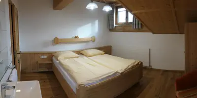 Ein Bett oder Betten in einem Zimmer der Unterkunft Ferienwohnung Schaffenrath