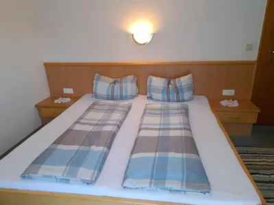 Ein Bett oder Betten in einem Zimmer der Unterkunft Apartment Landhaus Taxacher by Interhome