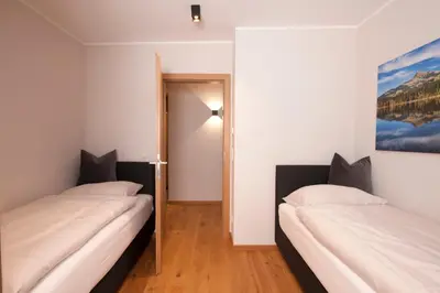 Ein Bett oder Betten in einem Zimmer der Unterkunft Kitzlife Apartements