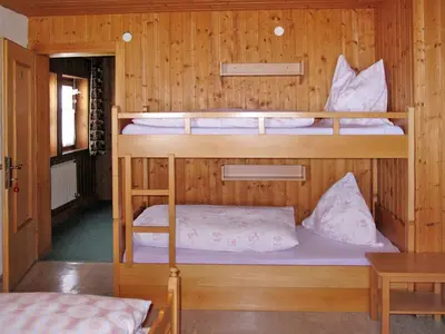 Ein Bett oder Betten in einem Zimmer der Unterkunft Holiday Home Moosen - NKI210 by Interhome