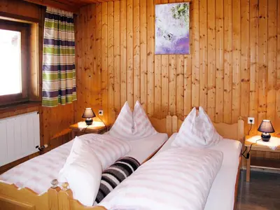 Ein Bett oder Betten in einem Zimmer der Unterkunft Holiday Home Moosen - NKI210 by Interhome