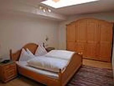 Ein Bett oder Betten in einem Zimmer der Unterkunft Appartements KALSWIRT