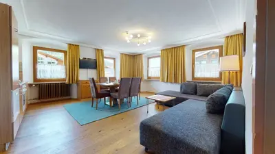 Ein Sitzbereich in der Unterkunft Appartements KALSWIRT