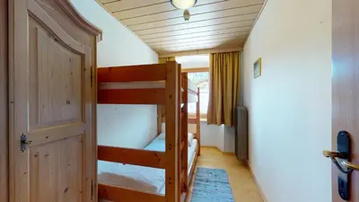 Ein Bett oder Betten in einem Zimmer der Unterkunft Appartements KALSWIRT