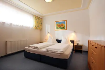 Ein Bett oder Betten in einem Zimmer der Unterkunft Appartements KALSWIRT