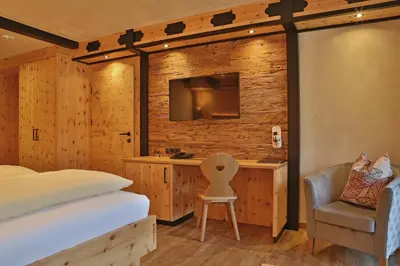 Ein Bett oder Betten in einem Zimmer der Unterkunft Hotel Hauserwirt