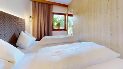 Ein Bett oder Betten in einem Zimmer der Unterkunft Ferienhaus Joel