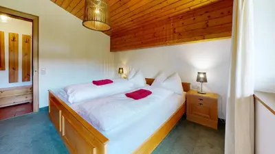 Ein Bett oder Betten in einem Zimmer der Unterkunft Ferienhaus Joel