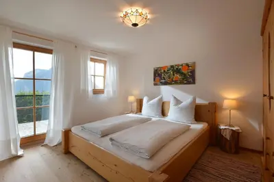 Ein Bett oder Betten in einem Zimmer der Unterkunft Krumpenhof