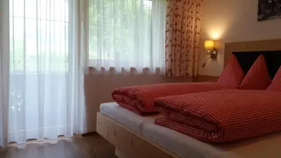 Ein Bett oder Betten in einem Zimmer der Unterkunft Ferienhof Stoffer