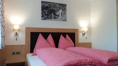 Ein Bett oder Betten in einem Zimmer der Unterkunft Ferienhof Stoffer