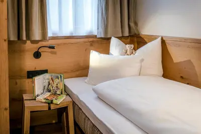 Ein Bett oder Betten in einem Zimmer der Unterkunft Kaiserlodge