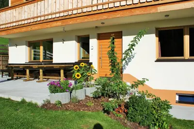 Ein Garten an der Unterkunft Ferienhaus Sonnhof am Walchsee