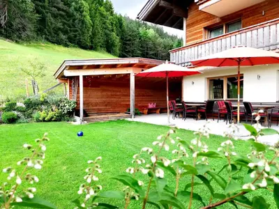 Ein Garten an der Unterkunft Ferienhaus Sonnhof am Walchsee