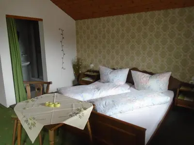 Ein Bett oder Betten in einem Zimmer der Unterkunft Altböckhof