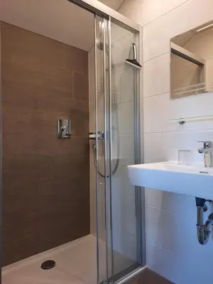 Ein Badezimmer in der Unterkunft Altböckhof