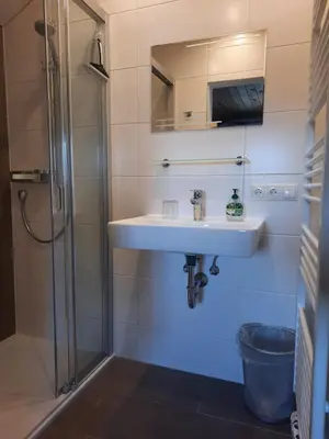 Ein Badezimmer in der Unterkunft Altböckhof