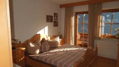 Ein Bett oder Betten in einem Zimmer der Unterkunft Ferienwohnung Eder
