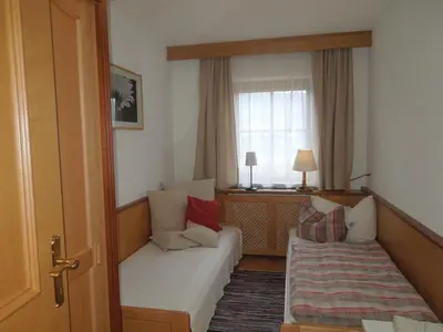 Ein Bett oder Betten in einem Zimmer der Unterkunft Ferienwohnung Eder