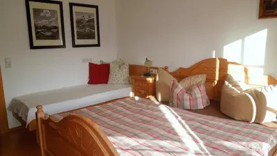 Ein Bett oder Betten in einem Zimmer der Unterkunft Ferienwohnung Eder