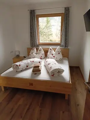 Ein Bett oder Betten in einem Zimmer der Unterkunft Ferienwohnung Leo