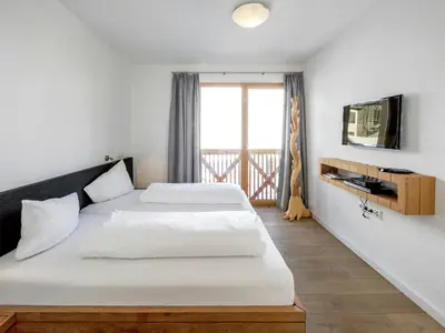 Ein Bett oder Betten in einem Zimmer der Unterkunft Apartment in Gerlos near Ski Slopes