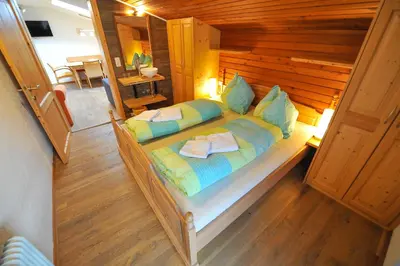 Ein Bett oder Betten in einem Zimmer der Unterkunft Pension Grubhof