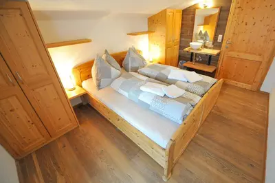 Ein Bett oder Betten in einem Zimmer der Unterkunft Pension Grubhof