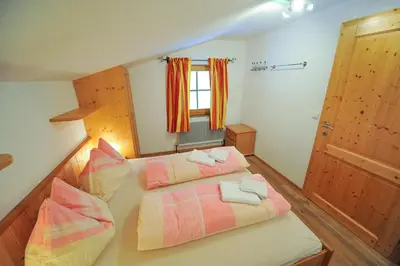 Ein Bett oder Betten in einem Zimmer der Unterkunft Pension Grubhof